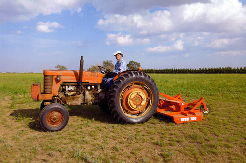 ben on tractor at taylor home